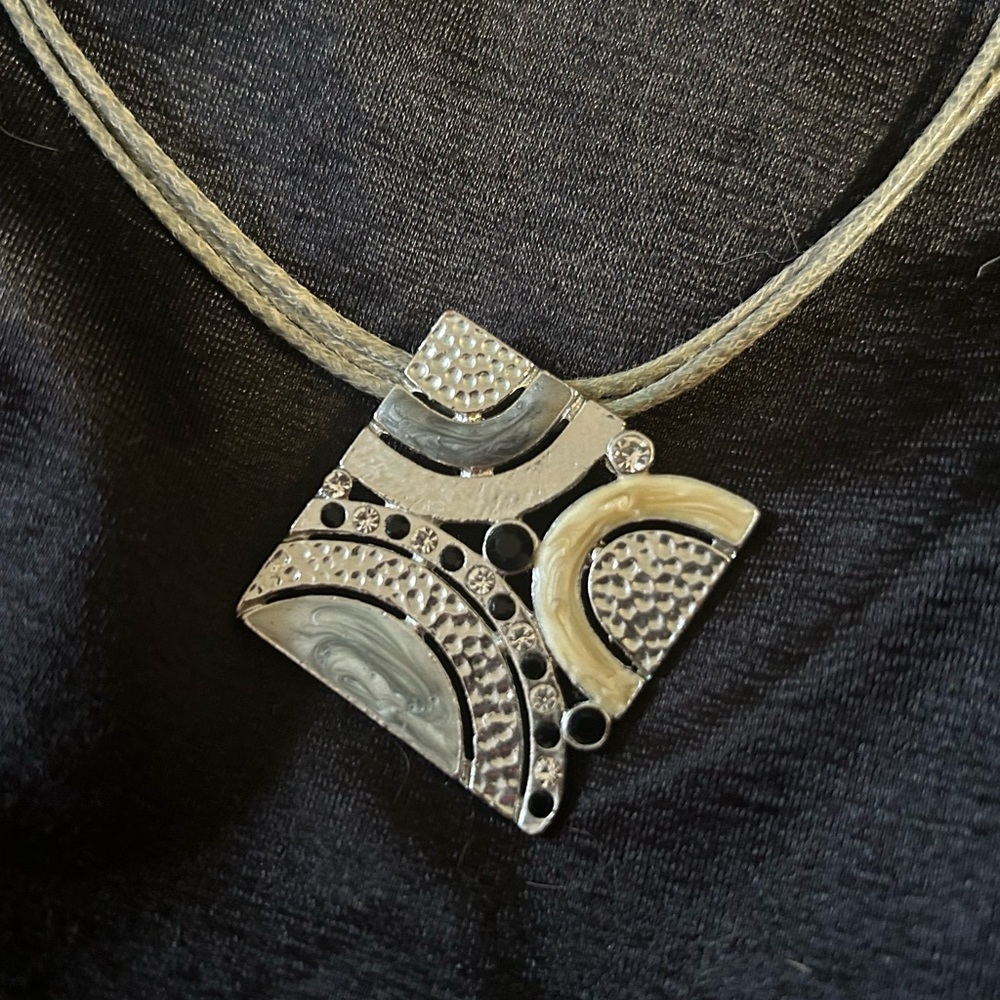 Contemporary Silver and Cream Necklace with Artistic Pendant